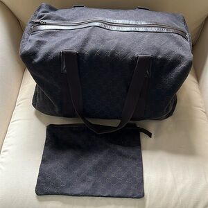 Authentic Gucci monogrammed large weekender duffle bag w/ matching pouch